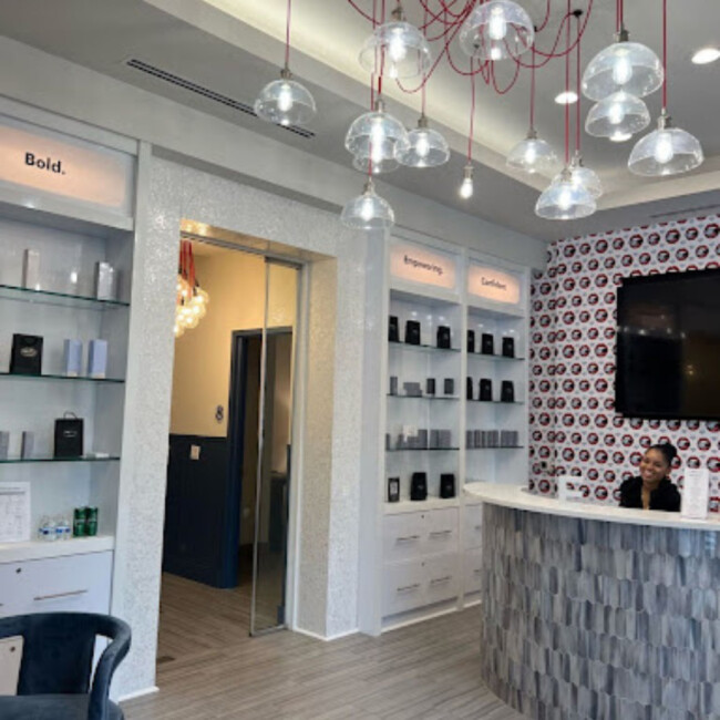 Evolve Med Spa front desk with modern chandelier 